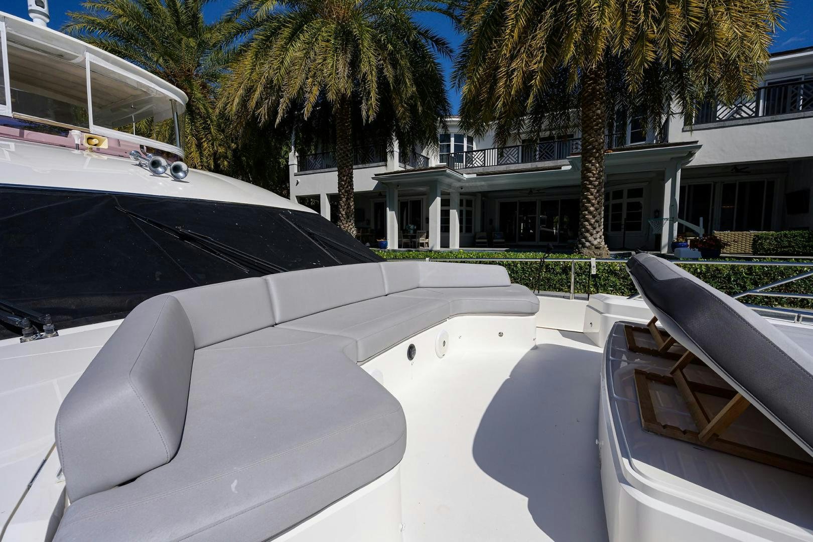 a white car parked in a driveway aboard KHATCH YOU LATER Yacht for Sale
