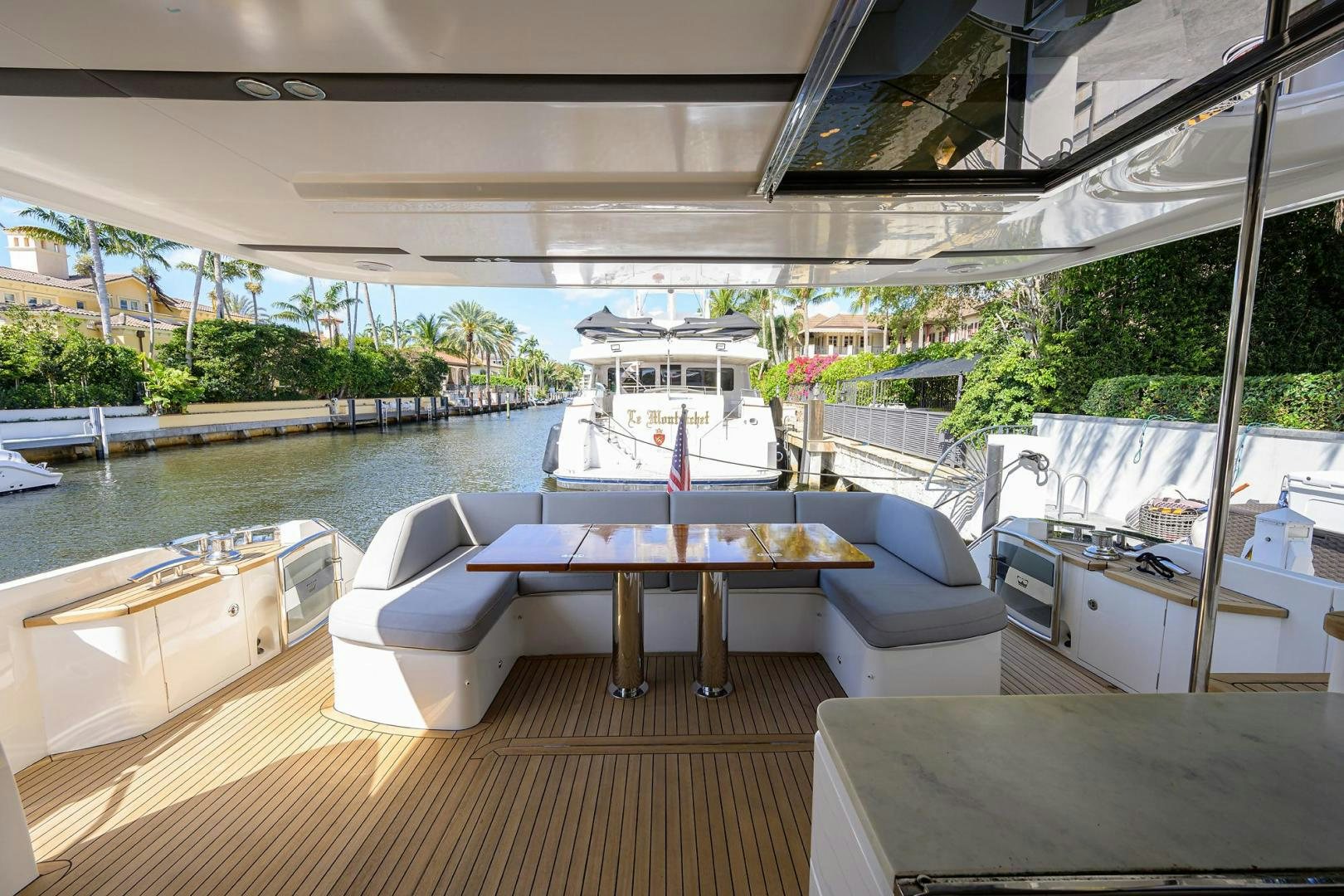 a room with a table and chairs aboard KHATCH YOU LATER Yacht for Sale