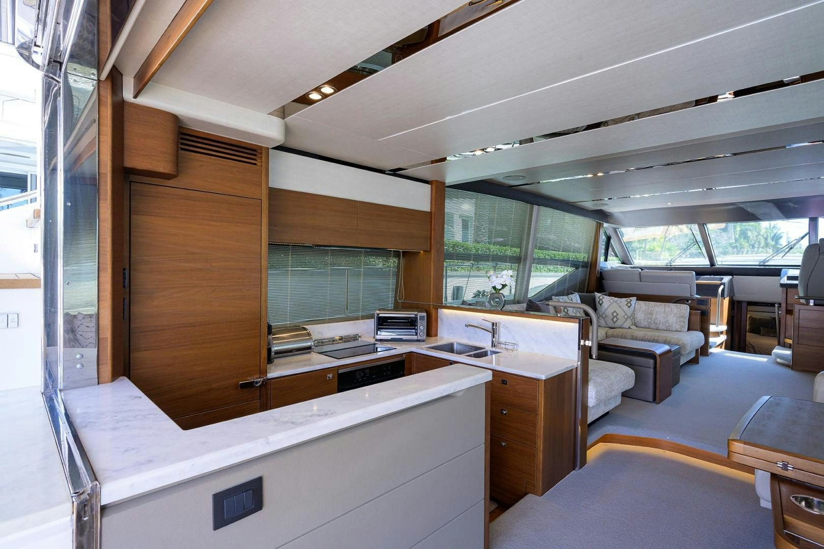 a room with a couch and a desk aboard KHATCH YOU LATER Yacht for Sale