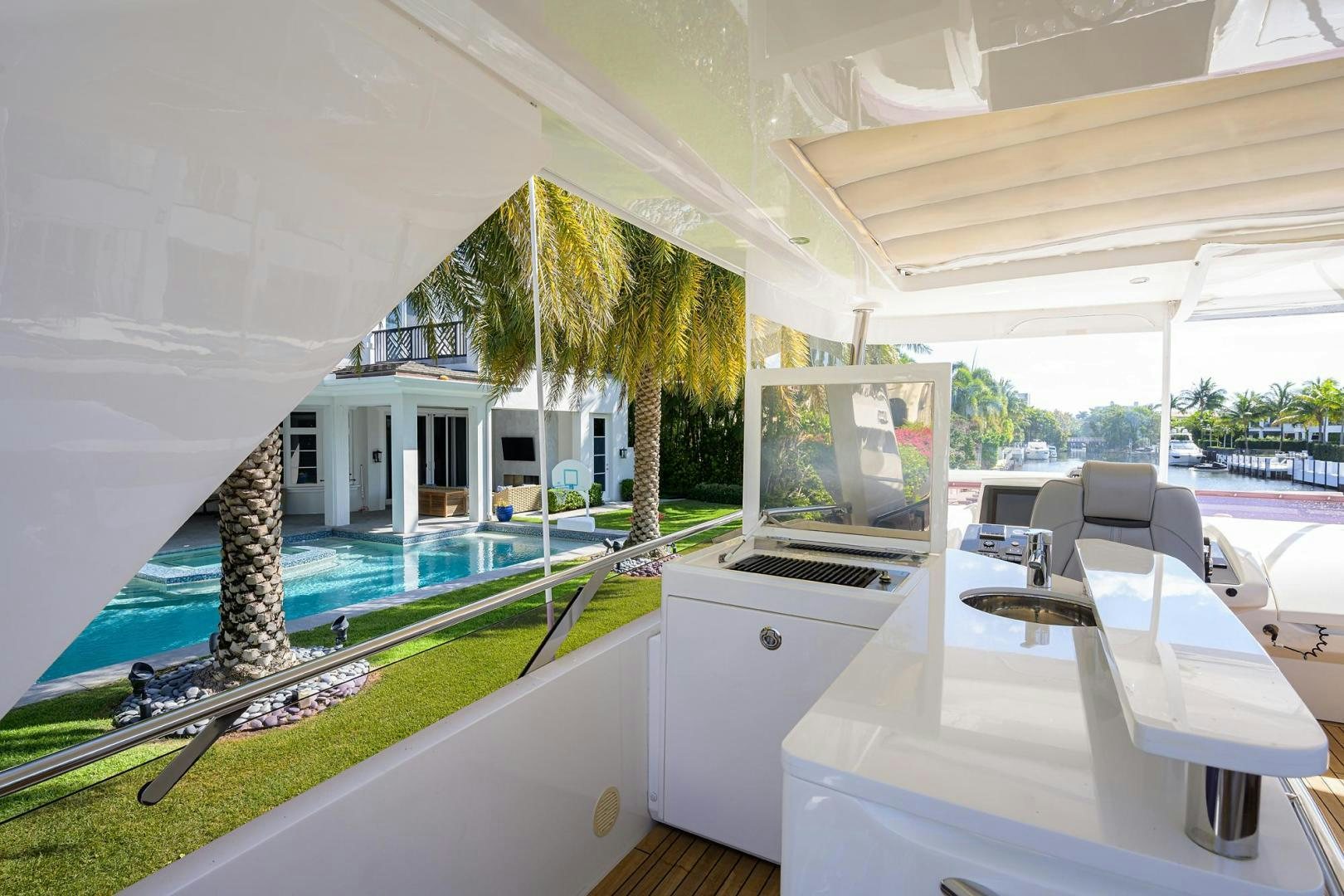 a large white tent with a pool aboard KHATCH YOU LATER Yacht for Sale