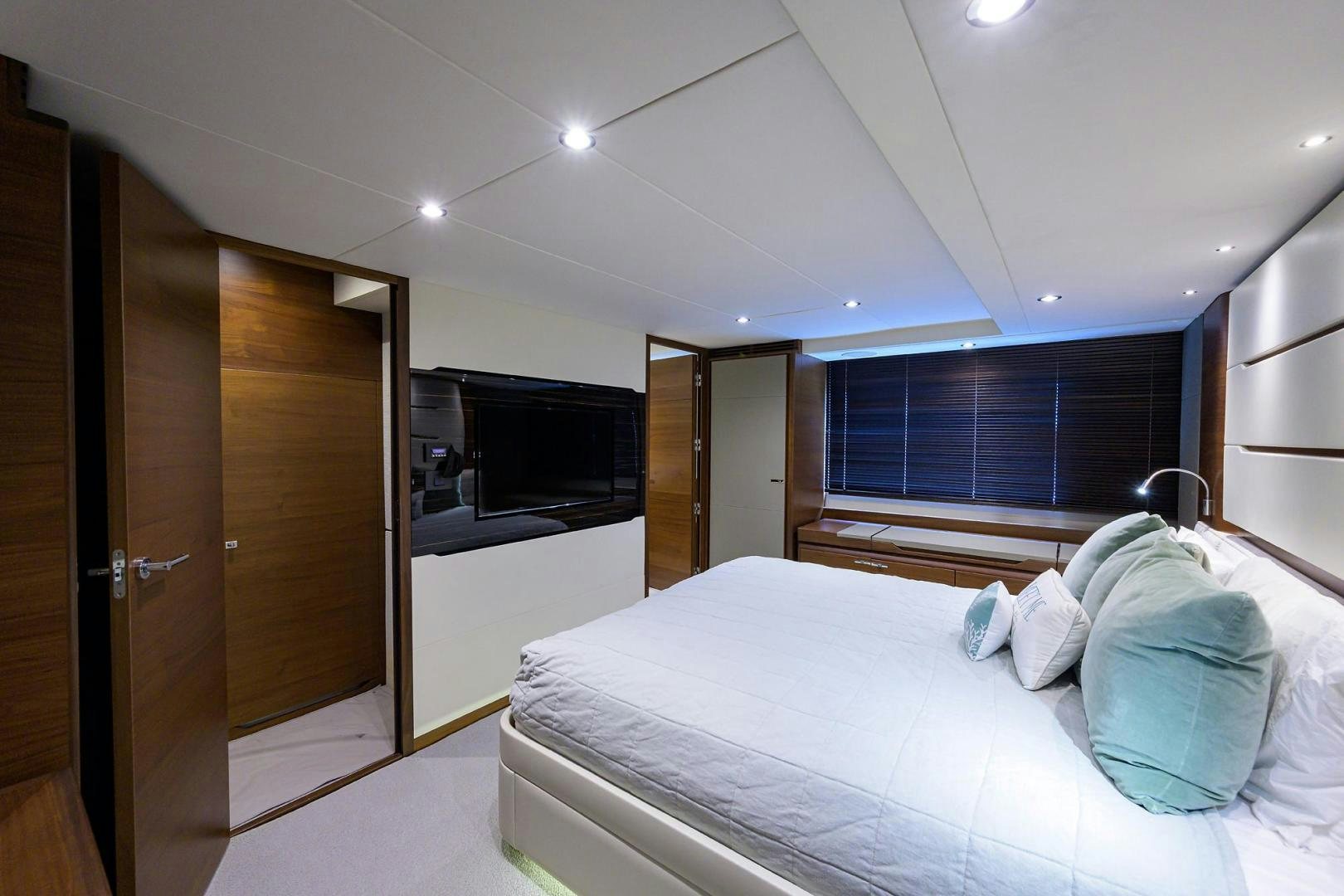 a bed in a room aboard KHATCH YOU LATER Yacht for Sale