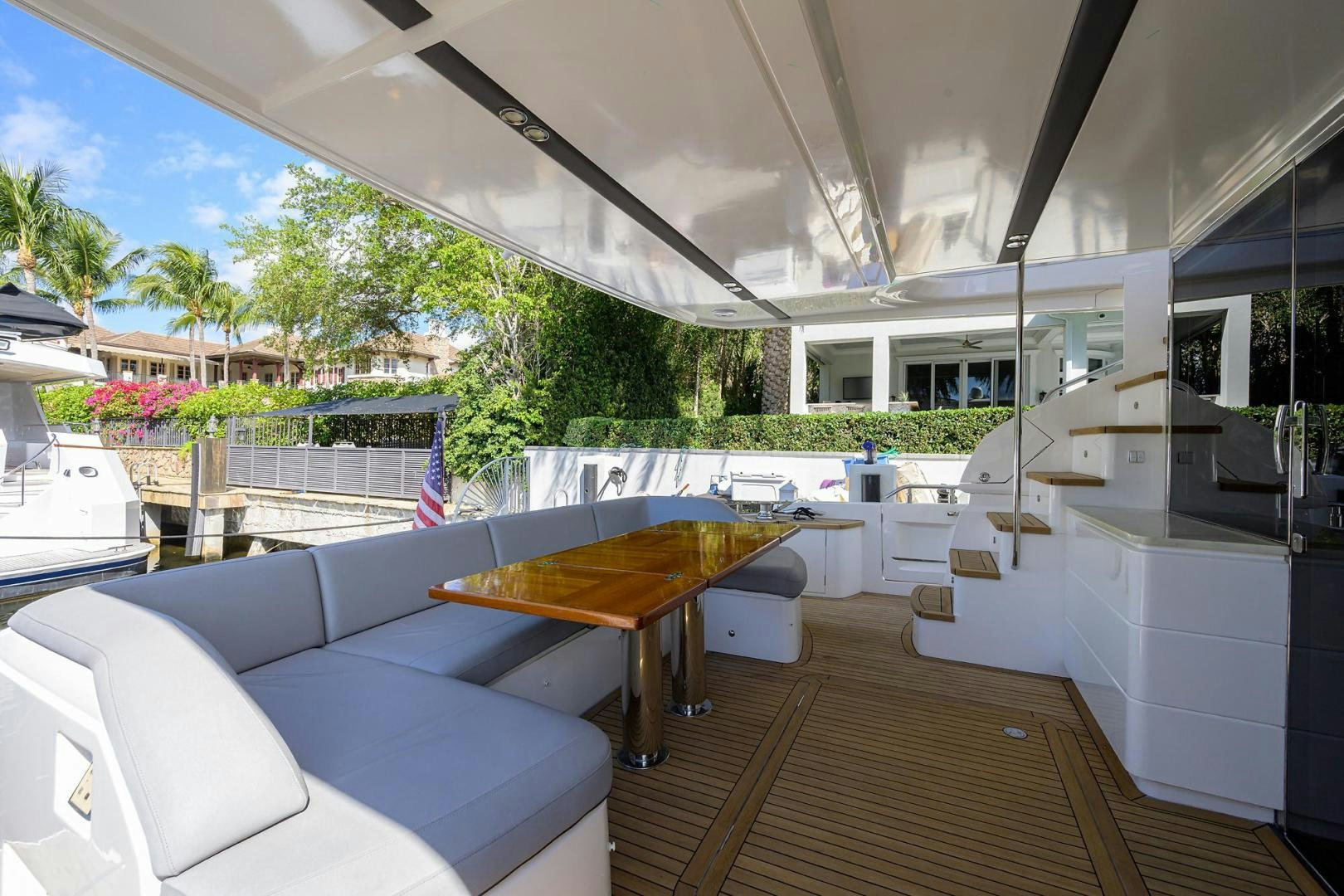 a room with a table and chairs aboard KHATCH YOU LATER Yacht for Sale