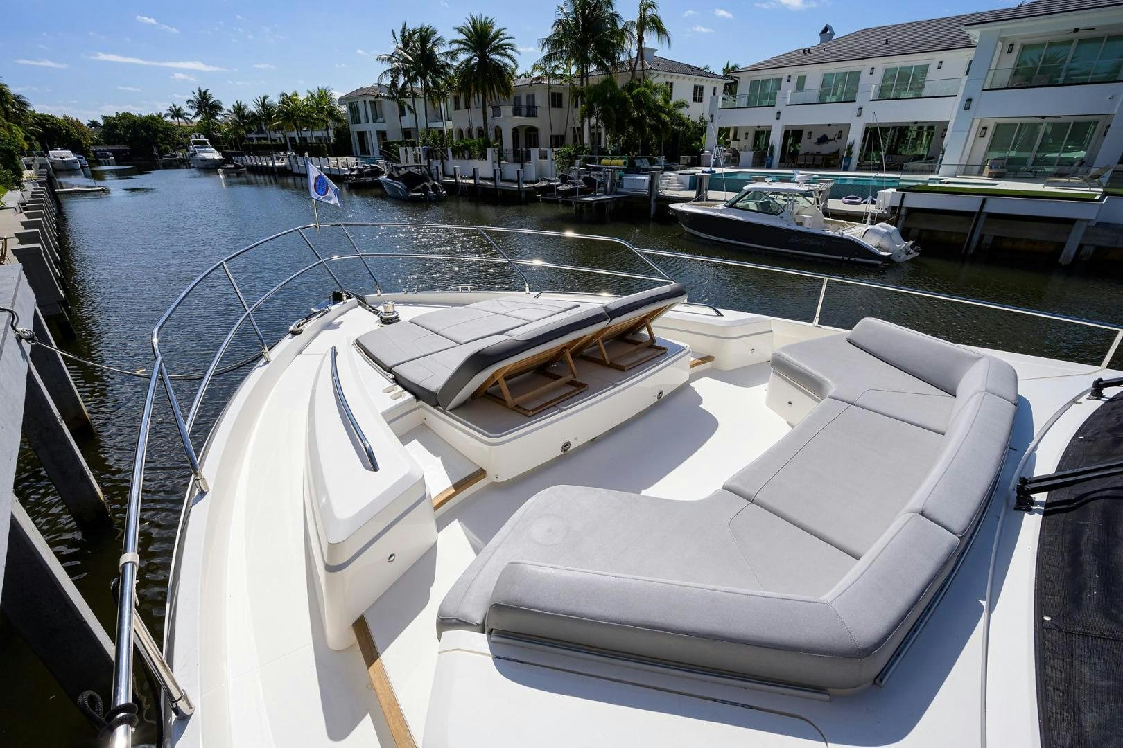 a boat docked at a pier aboard KHATCH YOU LATER Yacht for Sale