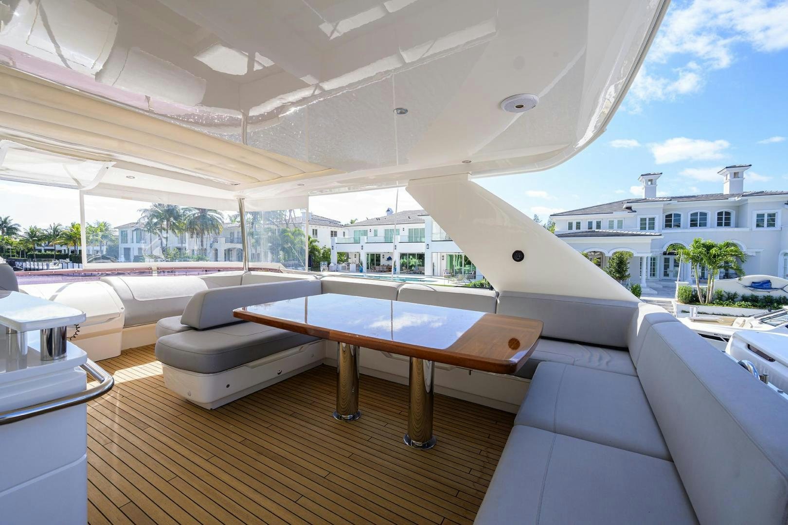 a room with a table and chairs aboard KHATCH YOU LATER Yacht for Sale