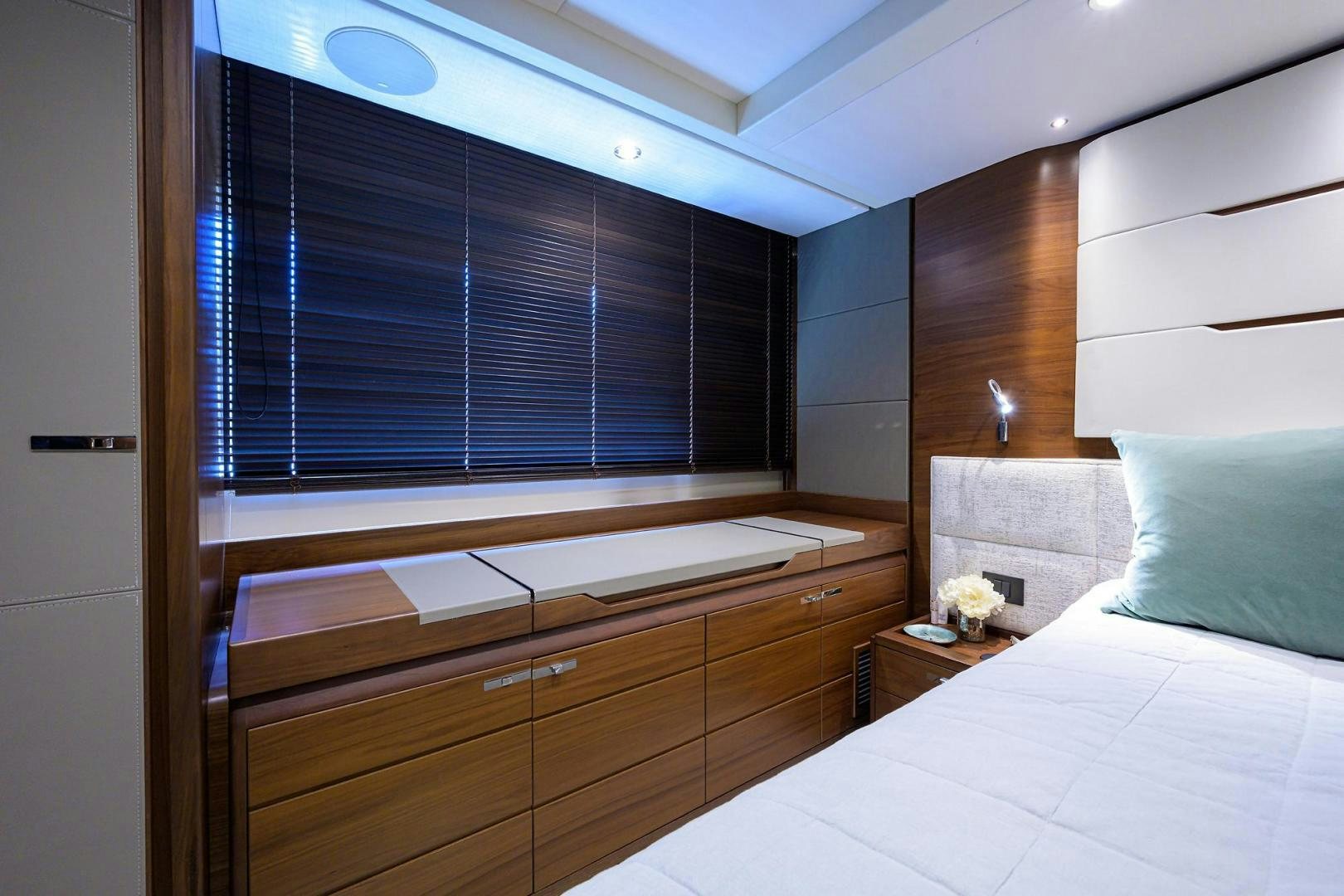 a room with a bed and a window aboard KHATCH YOU LATER Yacht for Sale