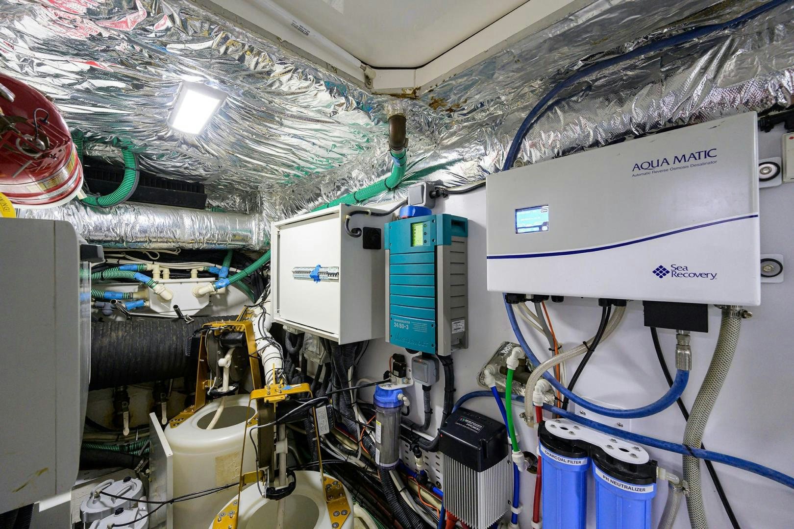 a room with several machines aboard KHATCH YOU LATER Yacht for Sale