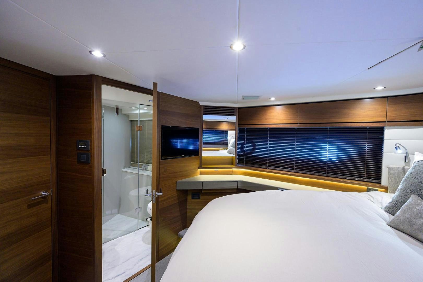 a room with a bed and a closet aboard KHATCH YOU LATER Yacht for Sale