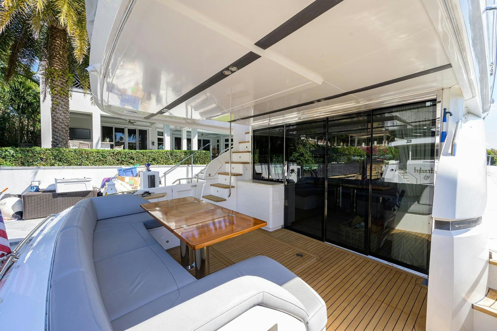 a room with a table and chairs aboard KHATCH YOU LATER Yacht for Sale