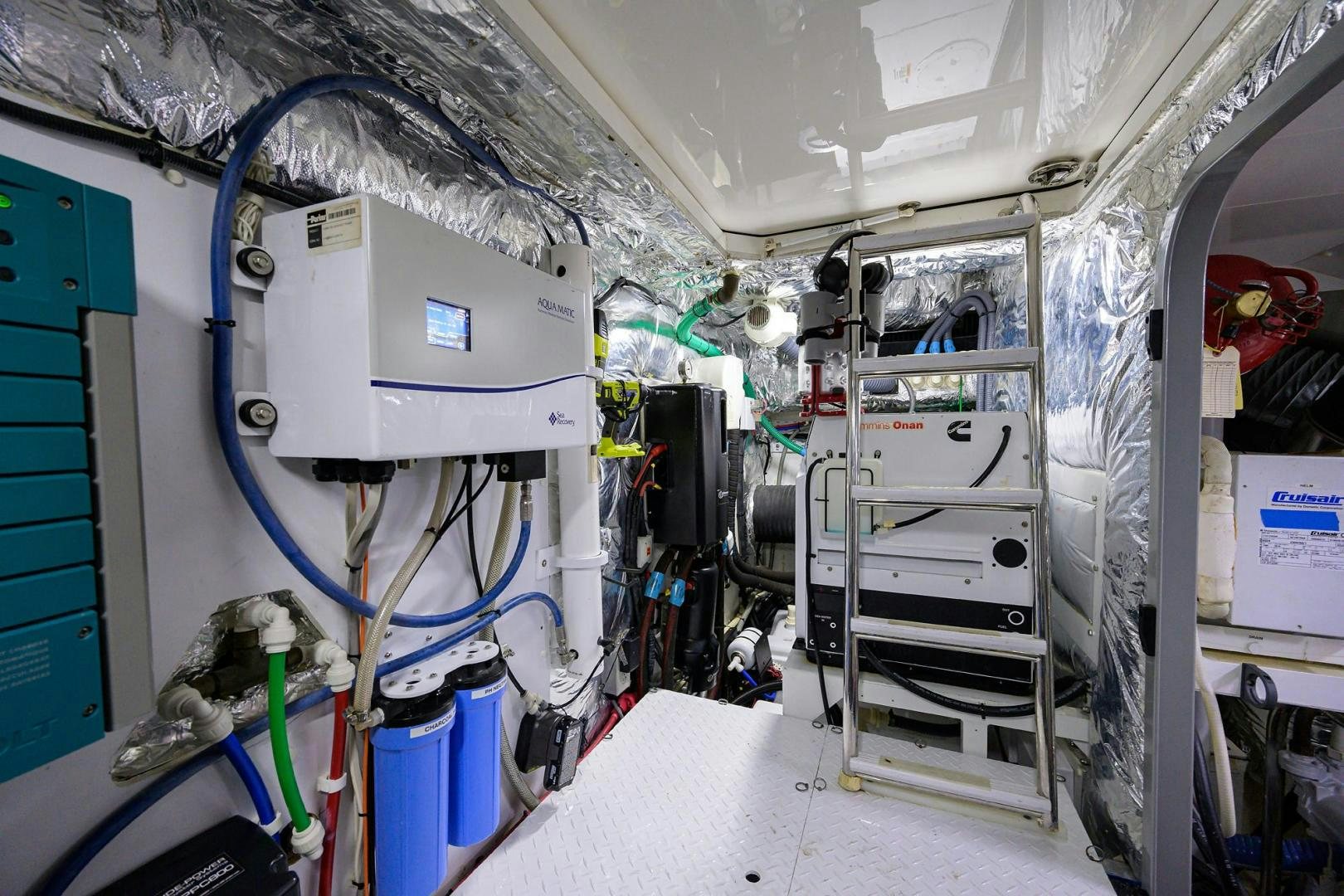 a room with a machine aboard KHATCH YOU LATER Yacht for Sale