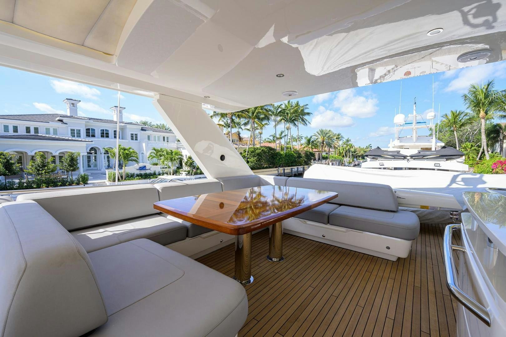 a table on a deck aboard KHATCH YOU LATER Yacht for Sale