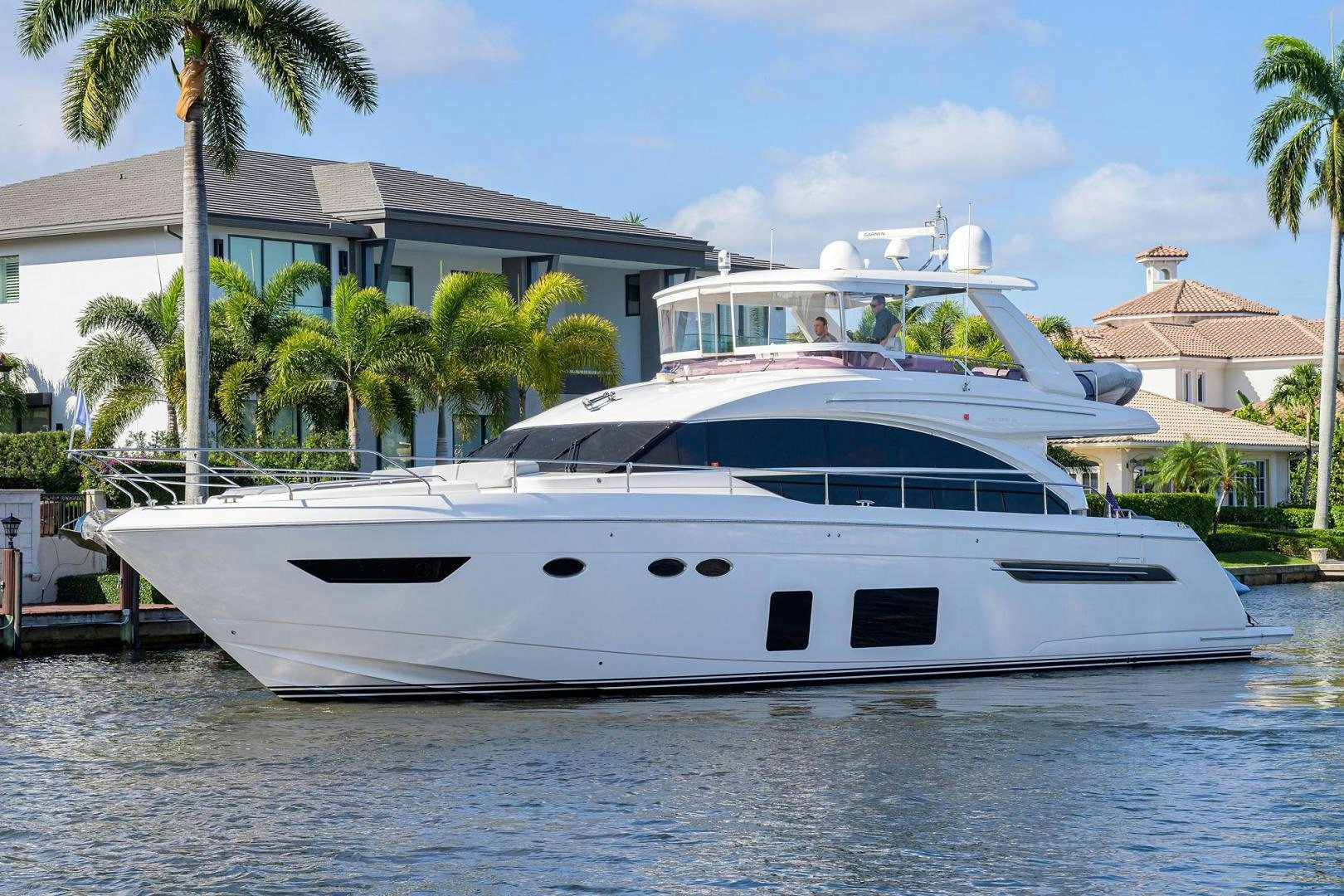 a white yacht in the water aboard KHATCH YOU LATER Yacht for Sale