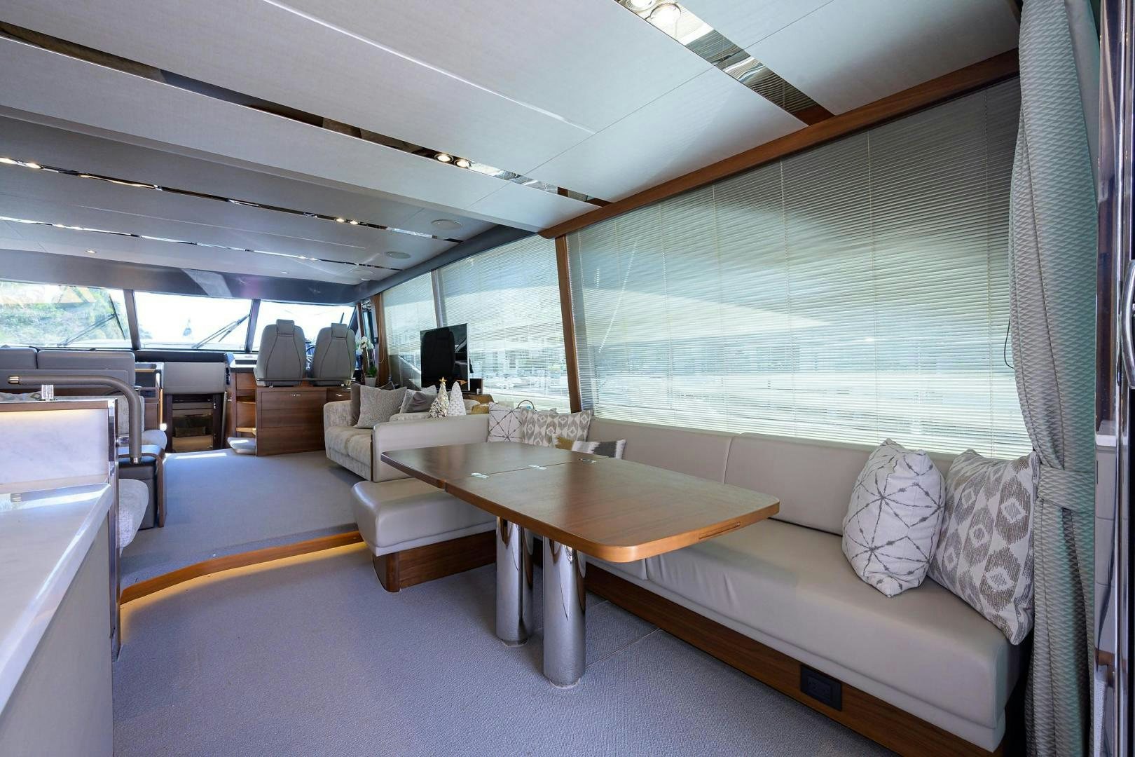a room with a couch and a table aboard KHATCH YOU LATER Yacht for Sale