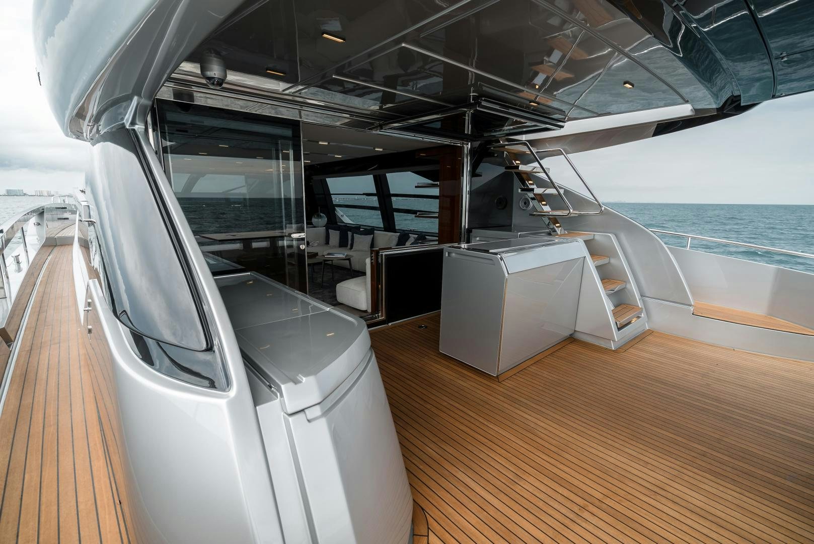 a boat with a large deck aboard BEL SOGNO Yacht for Sale