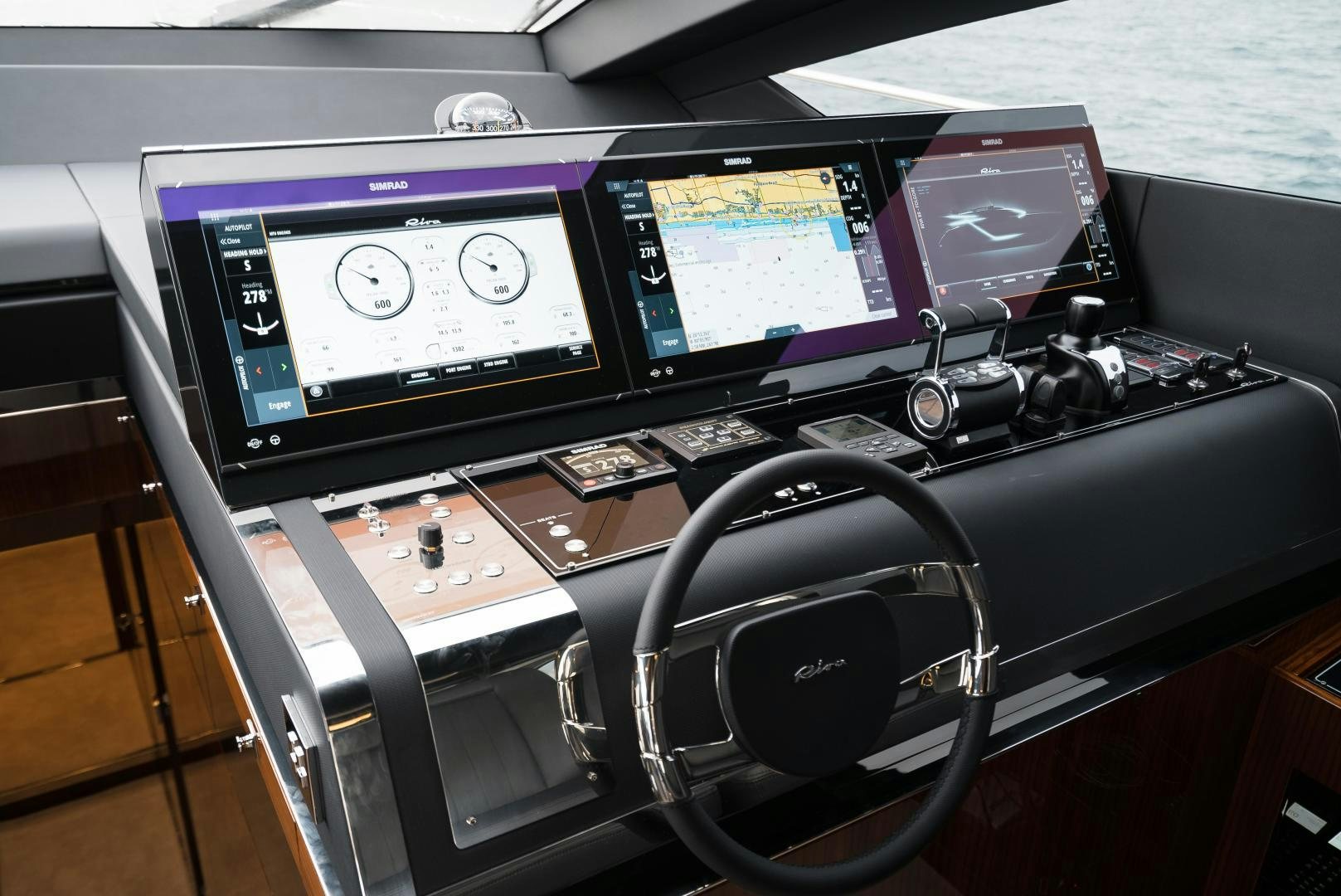 a black and silver console with a black headphones and a black keyboard aboard BEL SOGNO Yacht for Sale