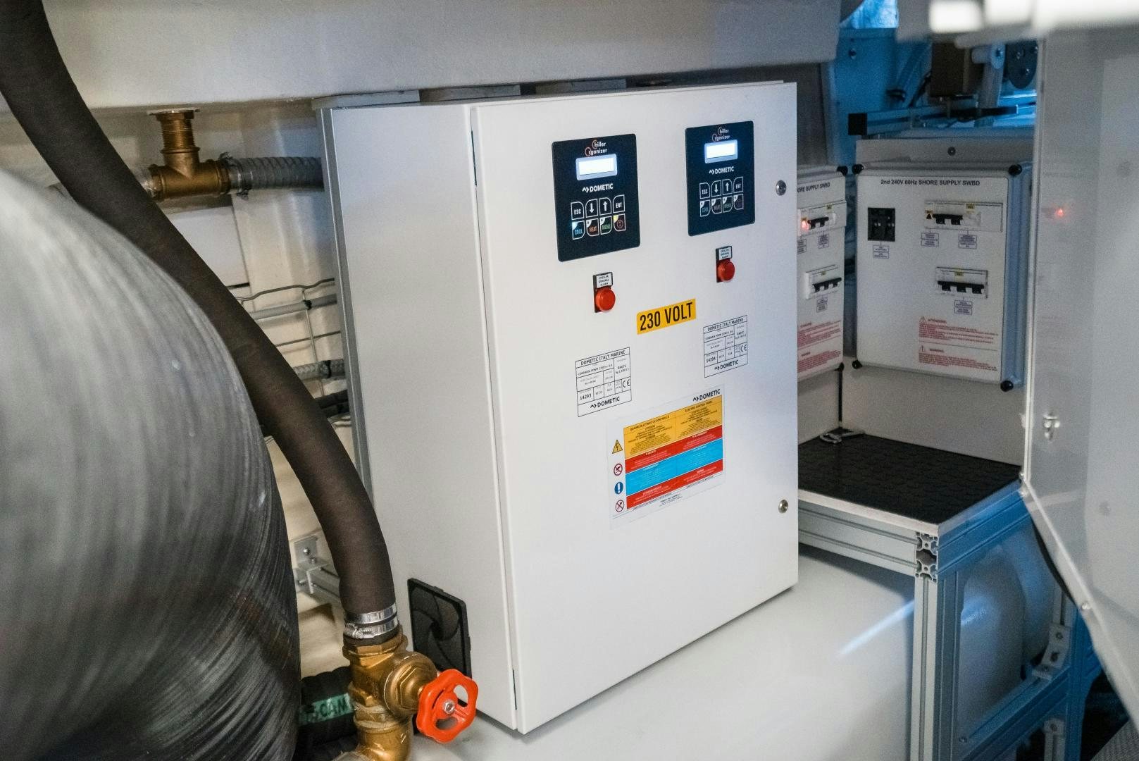 a white refrigerator in a store aboard BEL SOGNO Yacht for Sale