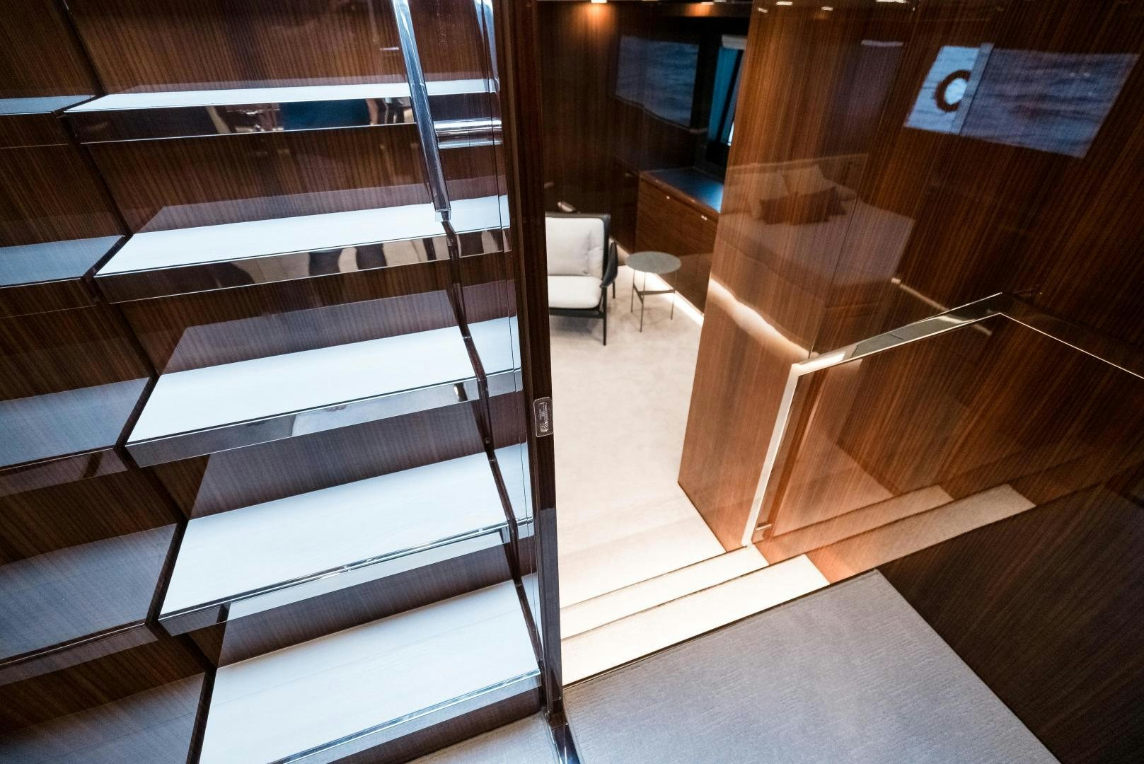 a set of stairs in a building aboard BEL SOGNO Yacht for Sale