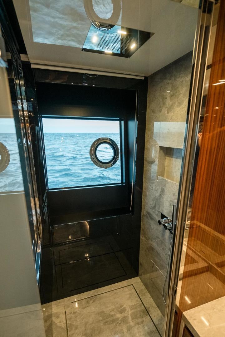 a glass door with a glass window aboard BEL SOGNO Yacht for Sale