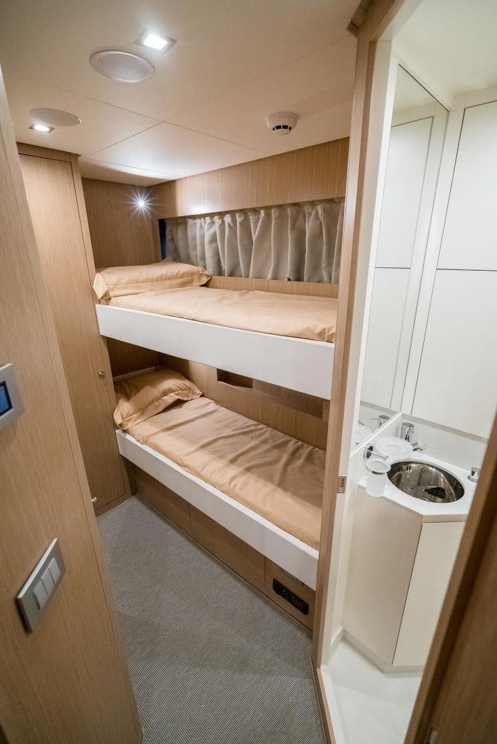 a small bathroom with a bed aboard BEL SOGNO Yacht for Sale