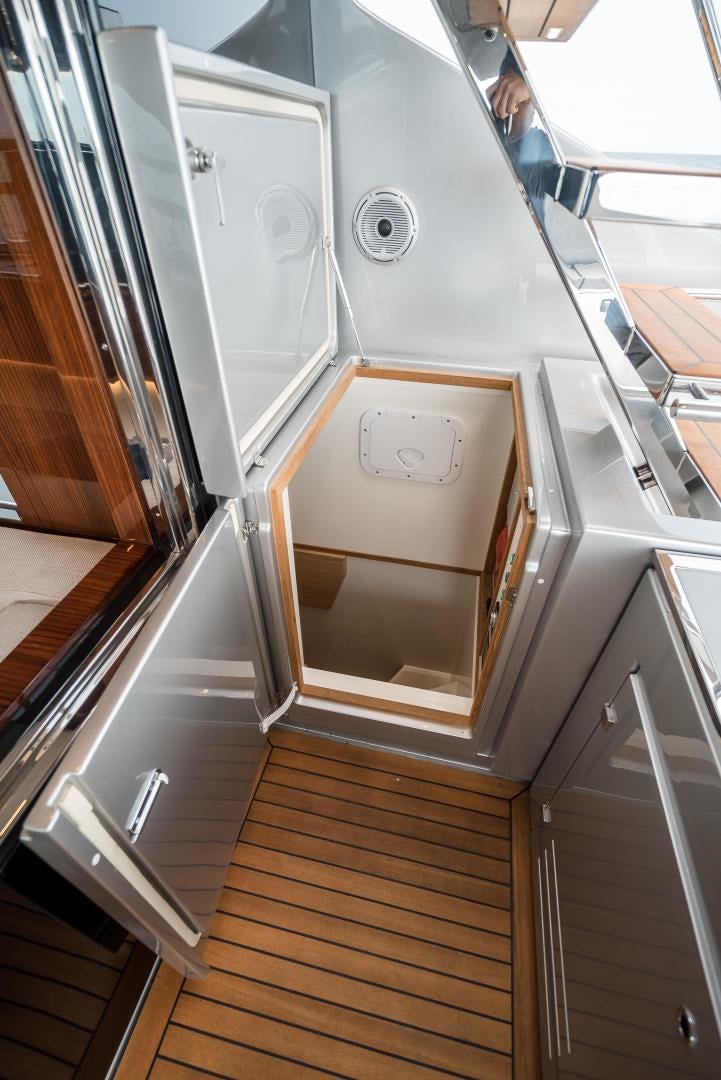 a kitchen with a microwave oven aboard BEL SOGNO Yacht for Sale