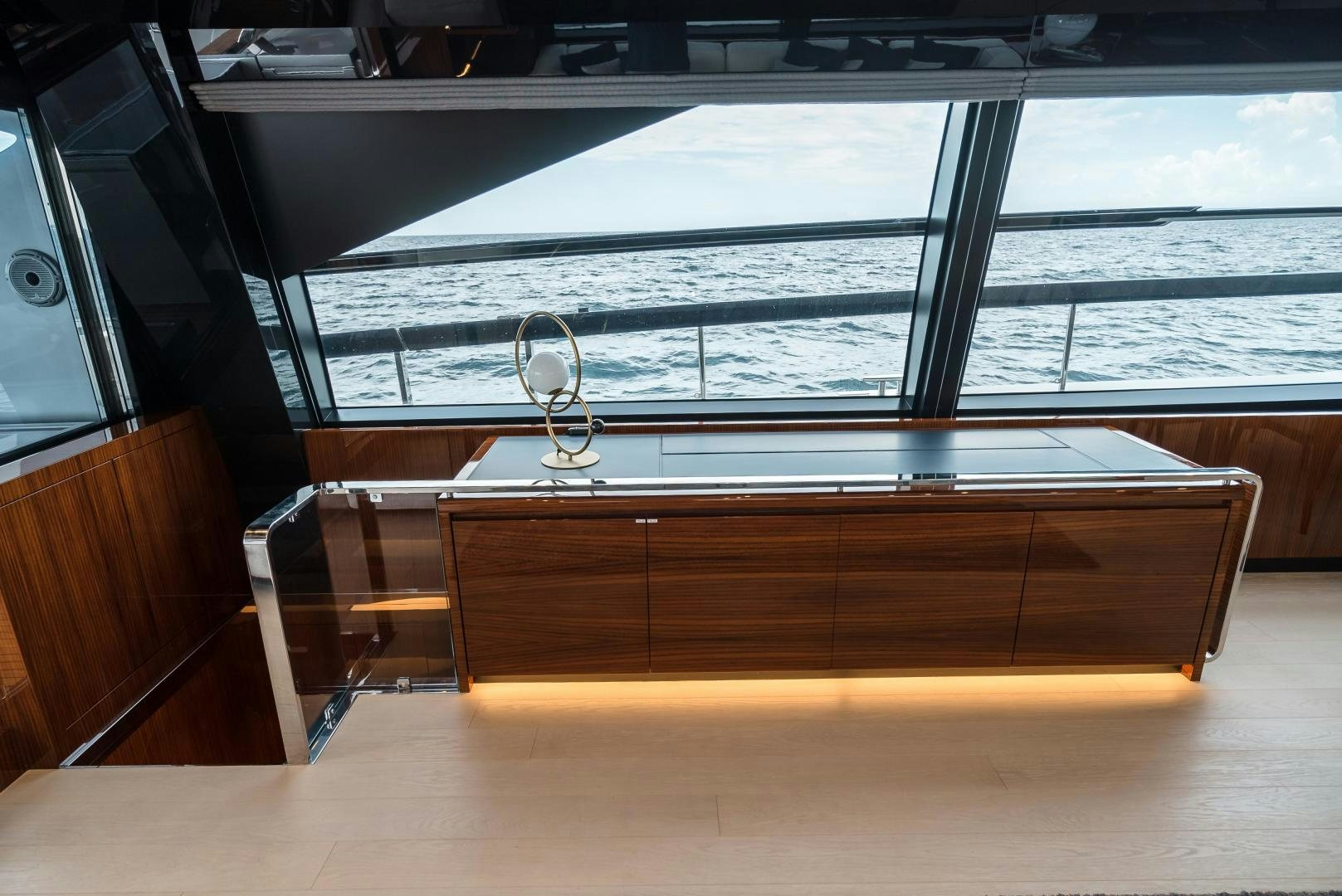 a wooden piano in a room aboard BEL SOGNO Yacht for Sale