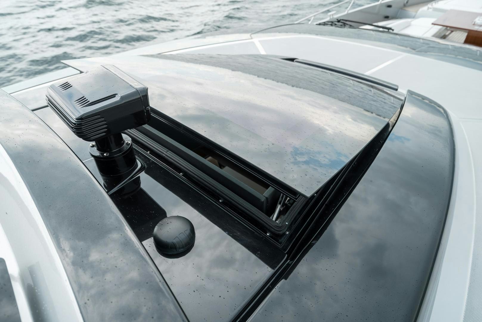 a black rectangular object on a white surface aboard BEL SOGNO Yacht for Sale