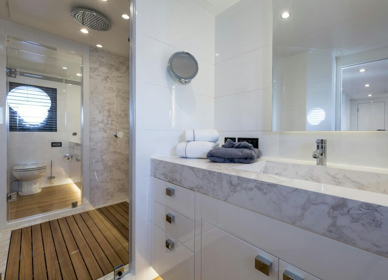 a bathroom with a tub sink and toilet aboard HEKATE, P372 Yacht for Sale