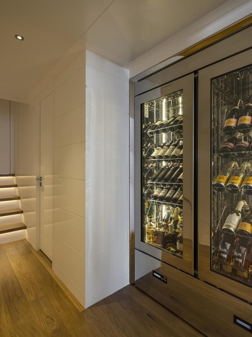 a room with a glass wall aboard HEKATE, P372 Yacht for Sale