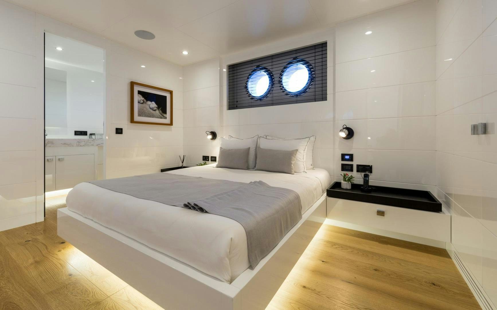 a large white bed in a room aboard HEKATE, P372 Yacht for Sale