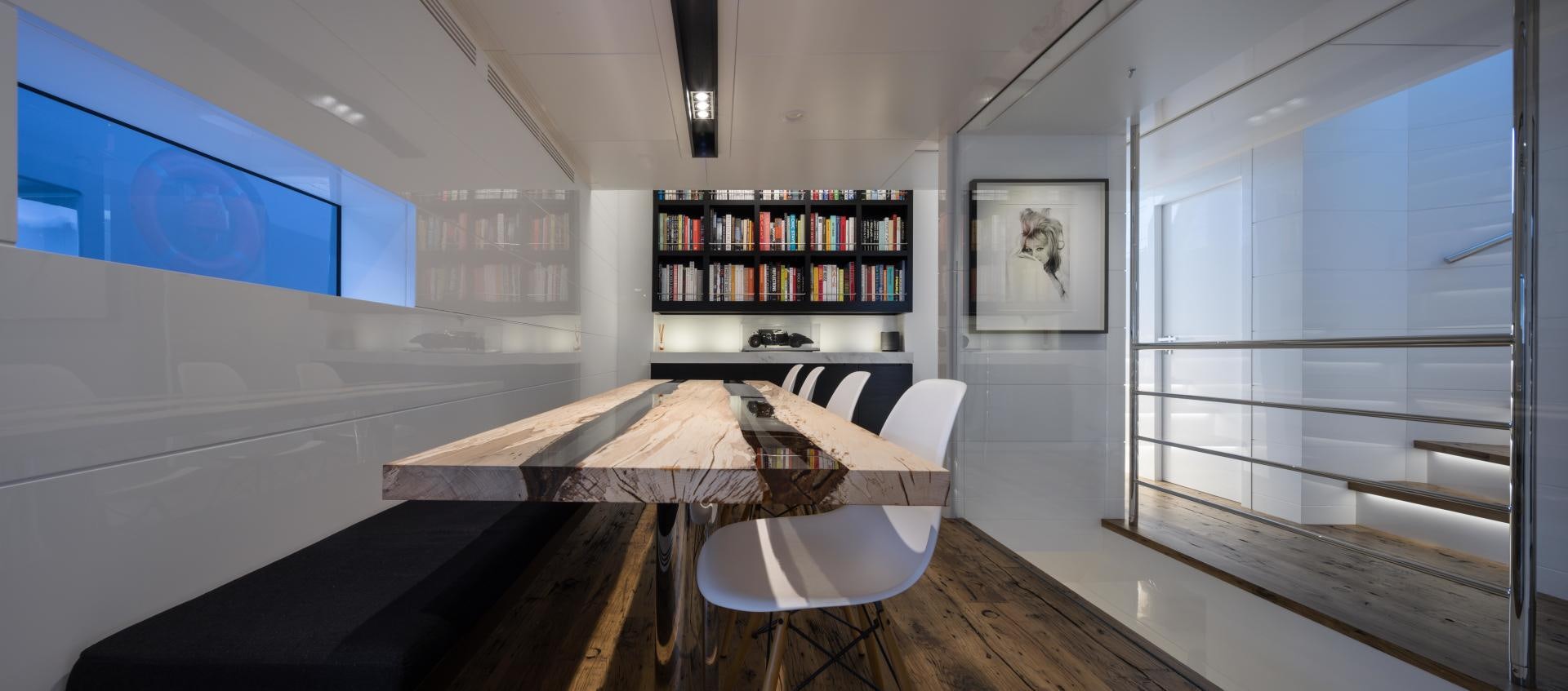 a room with a table and a window aboard HEKATE, P372 Yacht for Sale