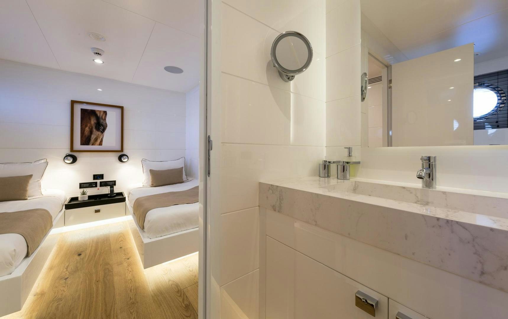 a bathroom with a tub sink and a mirror aboard HEKATE, P372 Yacht for Sale