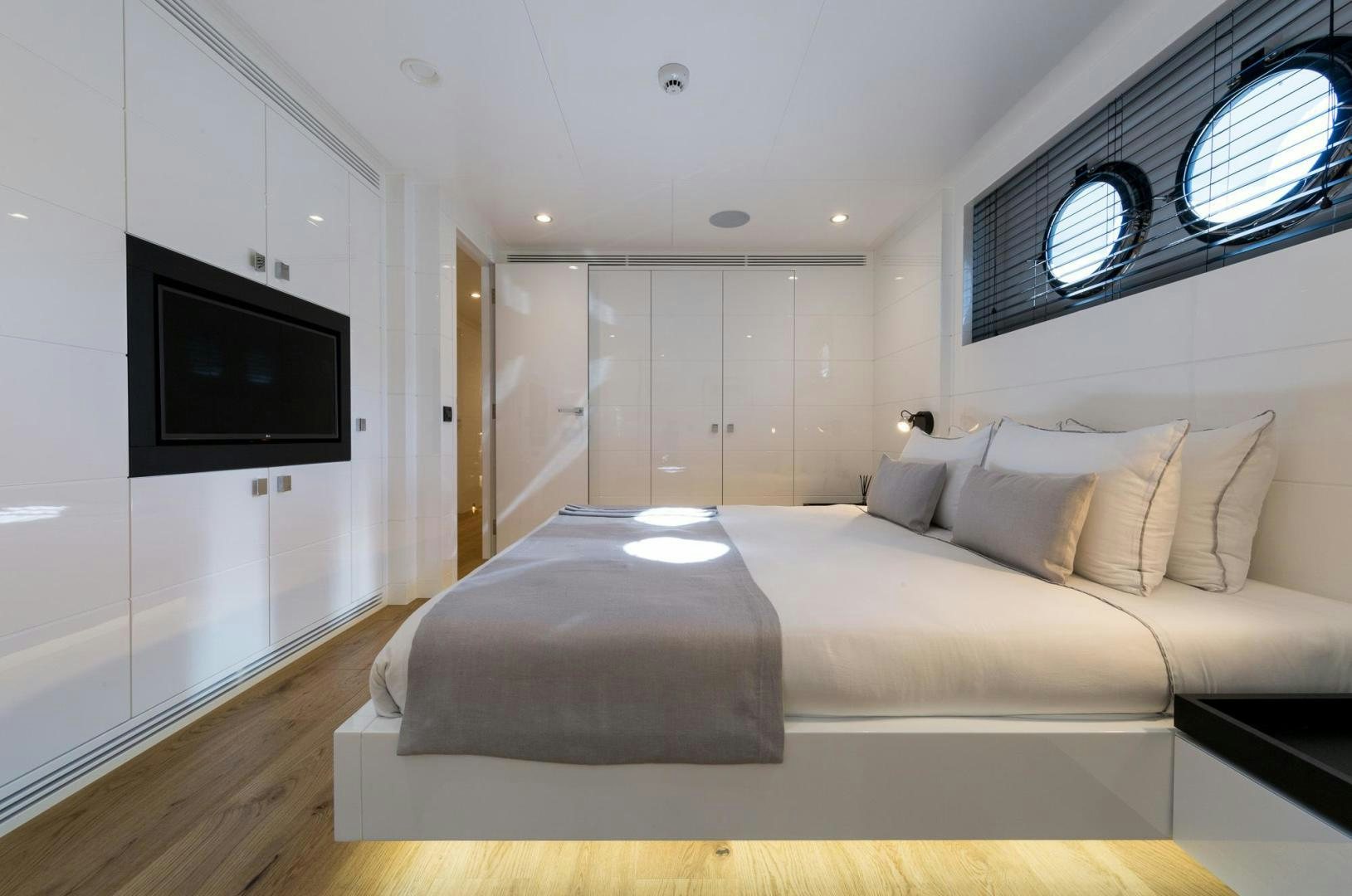 a bed in a room aboard HEKATE, P372 Yacht for Sale
