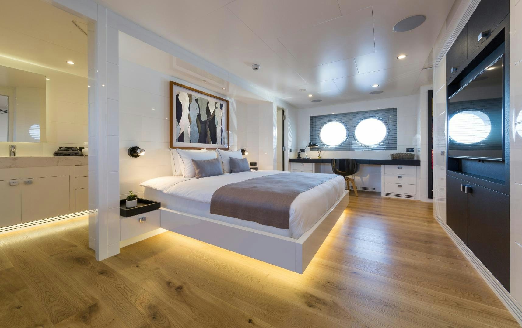 a room with a bed and a desk aboard HEKATE, P372 Yacht for Sale