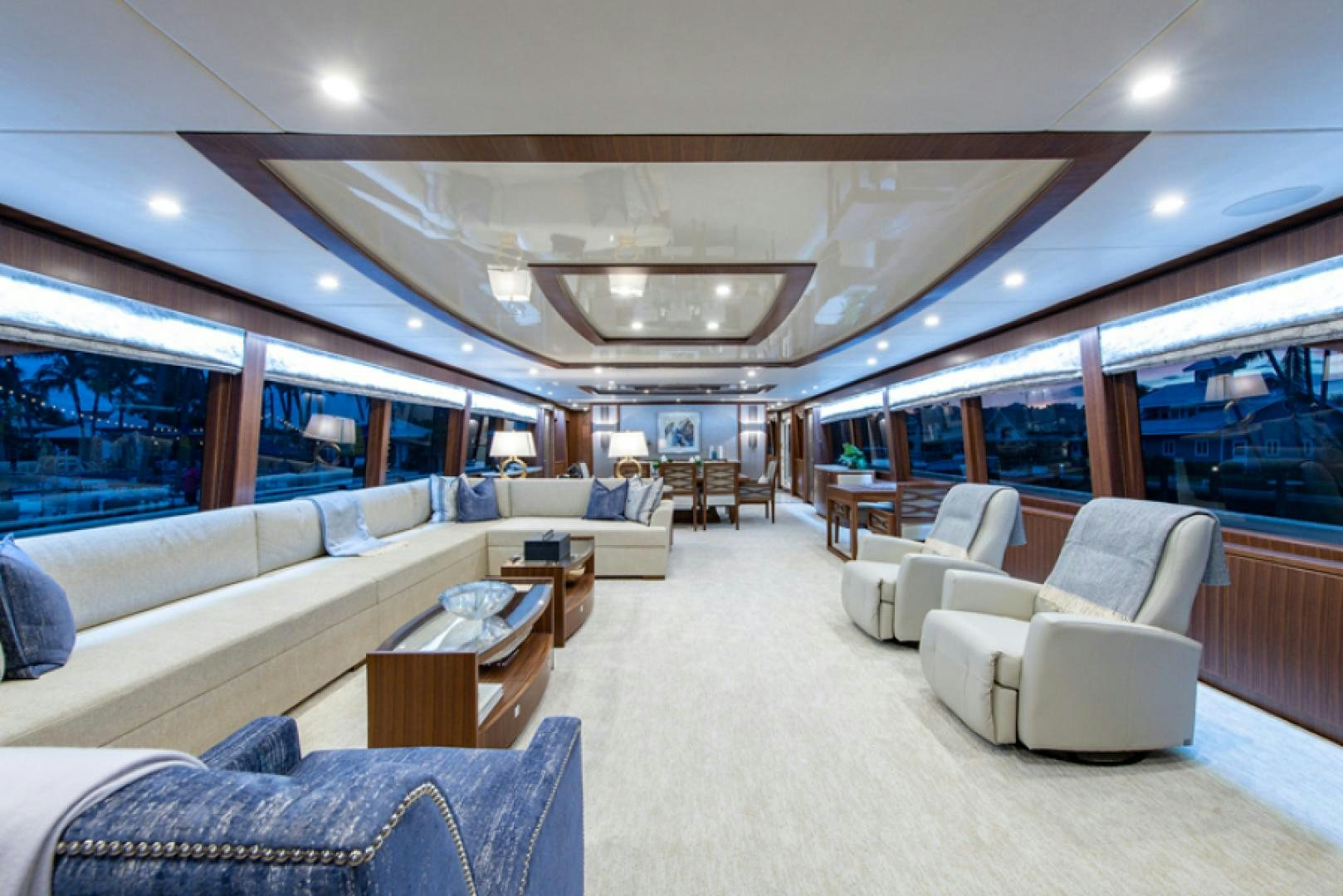 a living room with a large window aboard CONGVOYAGE Yacht for Sale