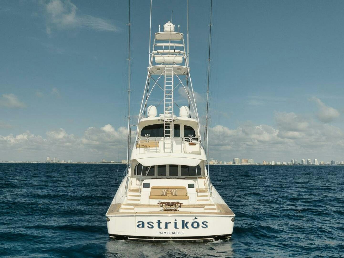 a white boat in the water aboard FA-LA-ME Yacht for Sale