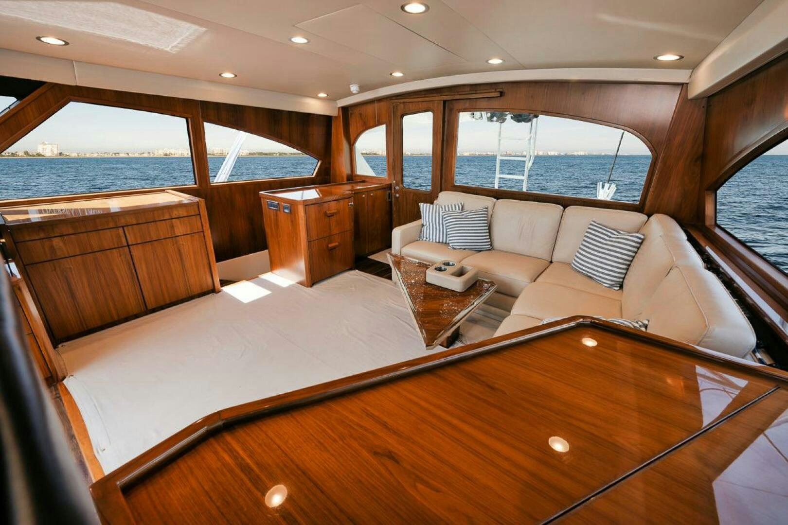 a large room with a large bed and a large window aboard FA-LA-ME Yacht for Sale