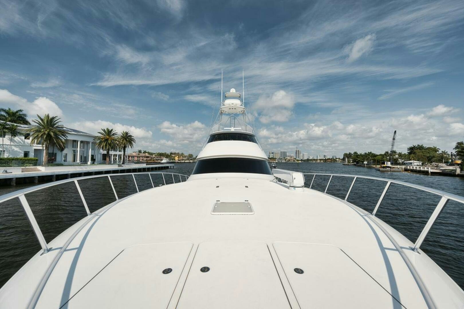 a large white boat on a road aboard FA-LA-ME Yacht for Sale