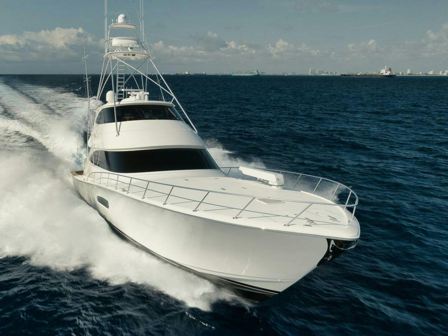 a white boat on the water aboard FA-LA-ME Yacht for Sale