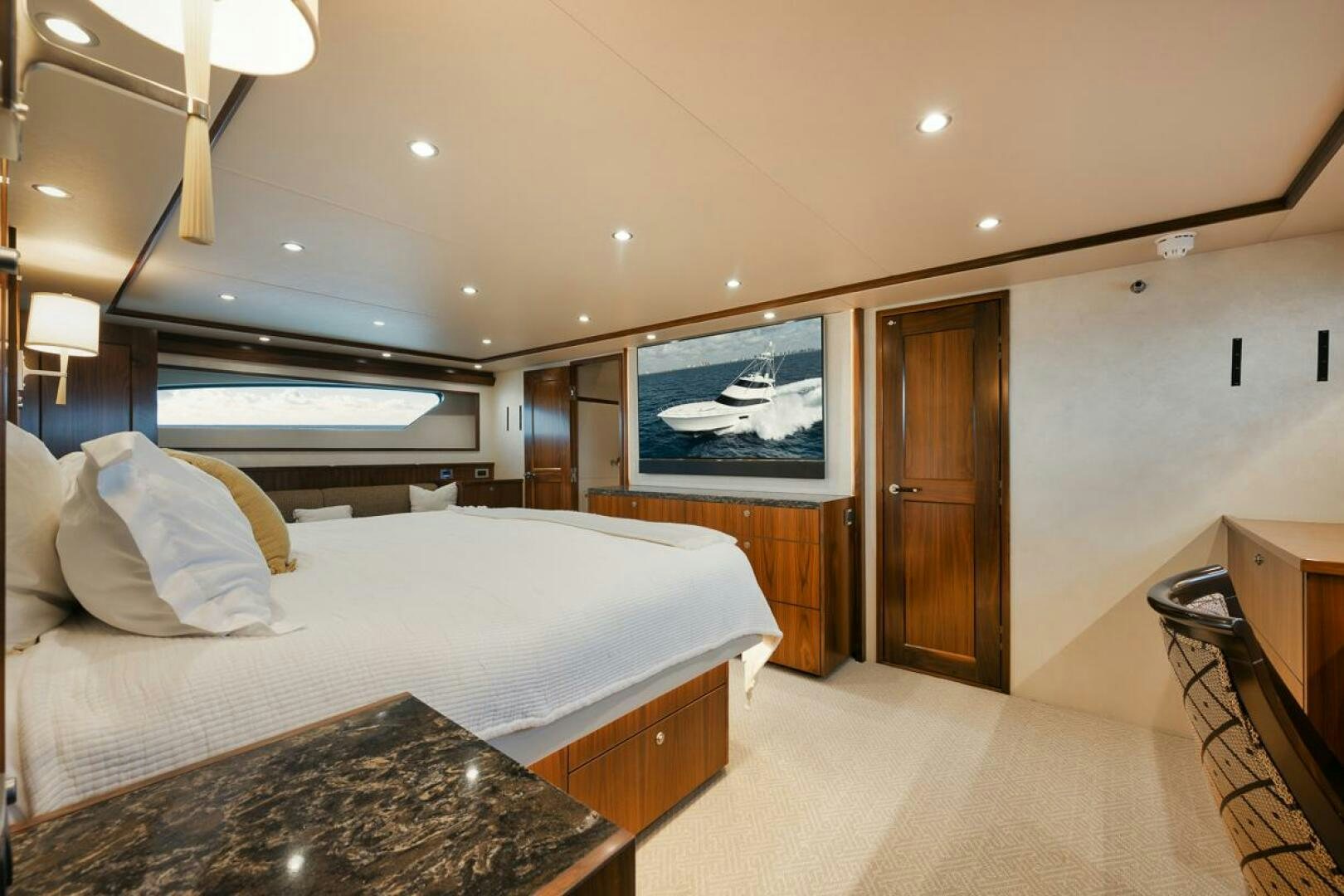 a bedroom with a large bed aboard FA-LA-ME Yacht for Sale