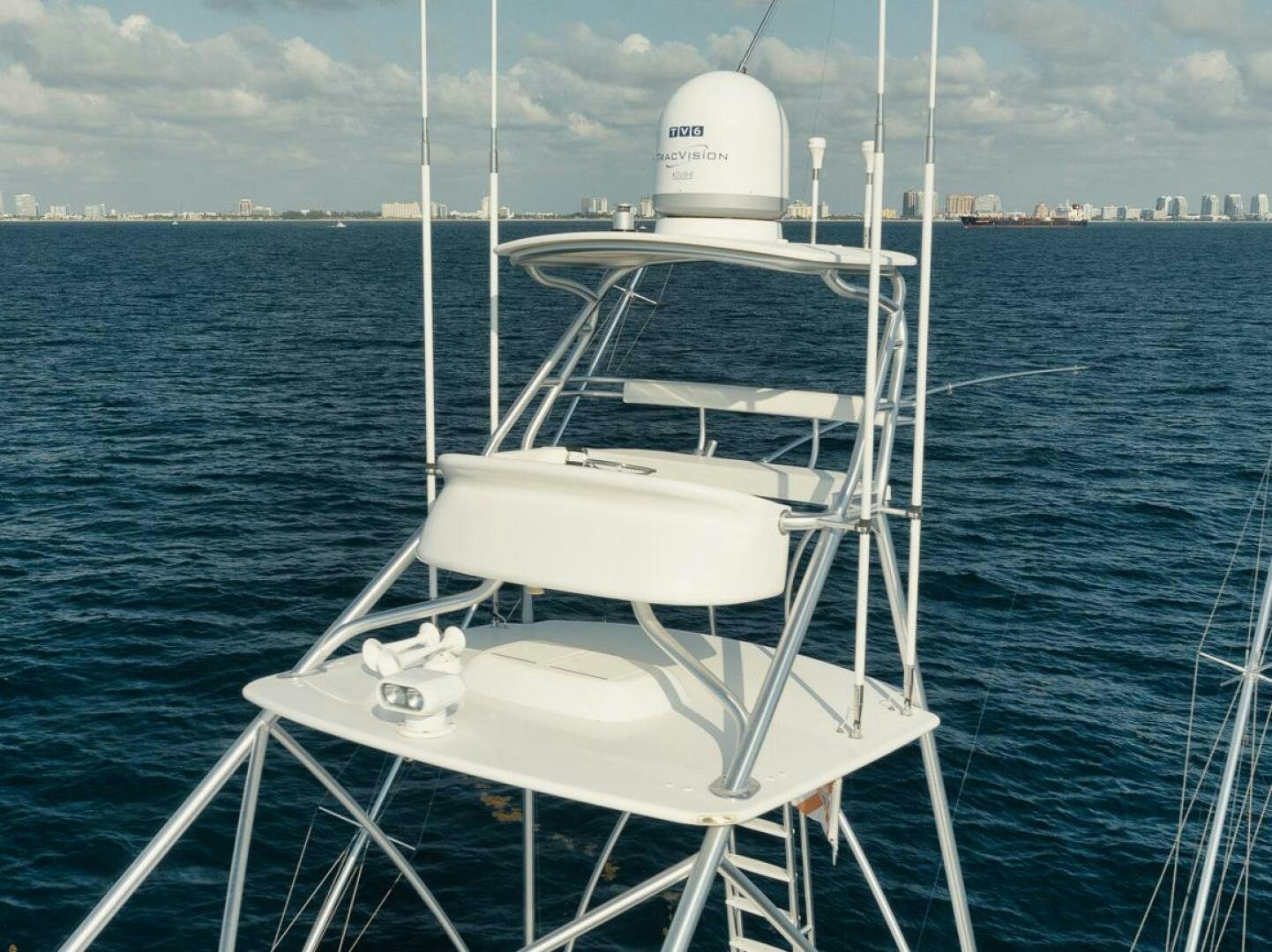 a white boat on the water aboard FA-LA-ME Yacht for Sale