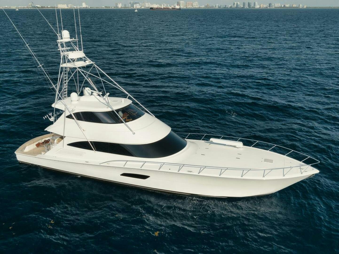 a white boat in the water aboard FA-LA-ME Yacht for Sale