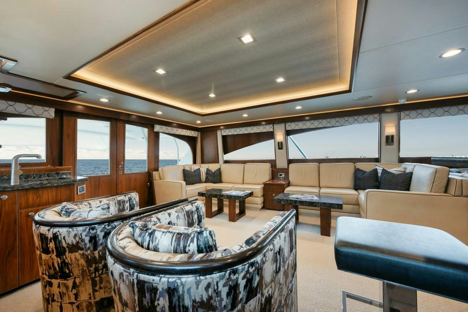 a living room with a large window aboard FA-LA-ME Yacht for Sale