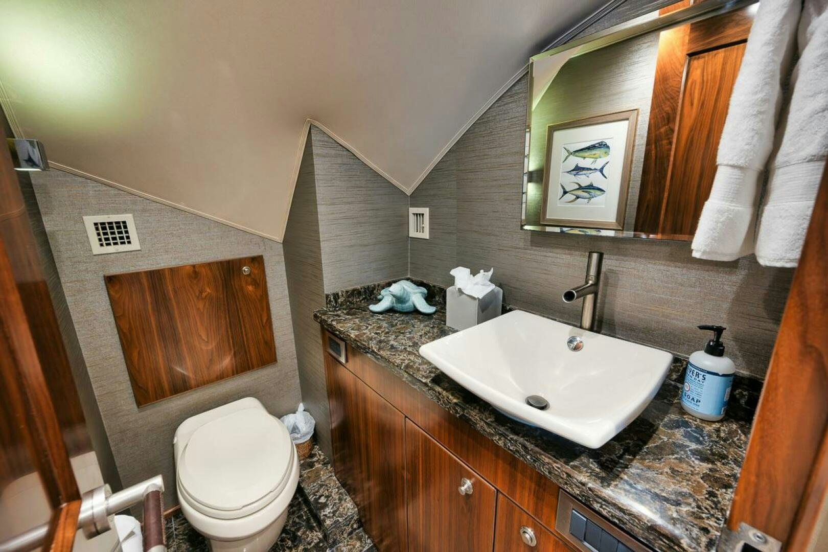 a bathroom with a sink and toilet aboard FA-LA-ME Yacht for Sale