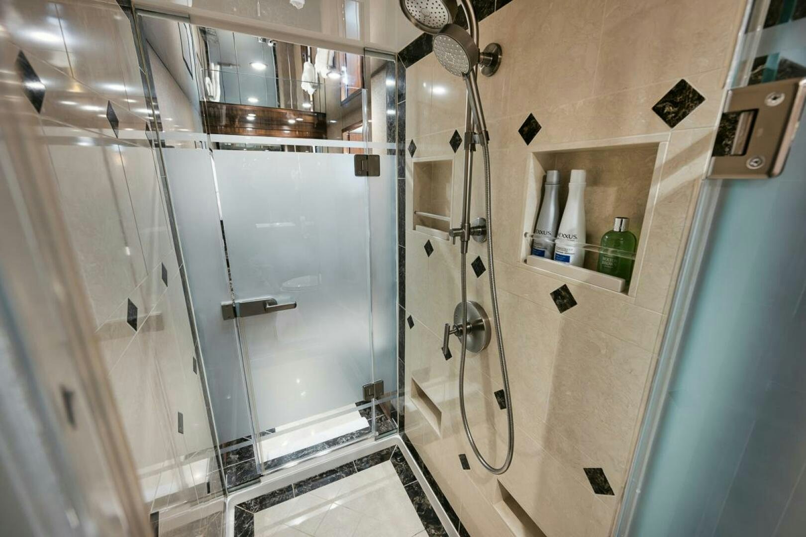 a shower with a glass door aboard FA-LA-ME Yacht for Sale