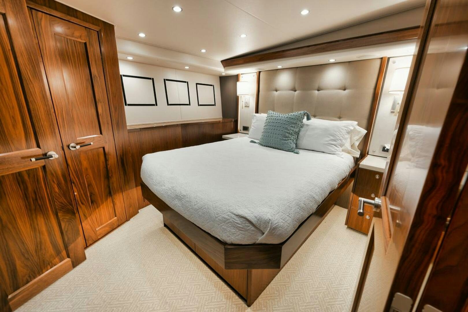 a large bedroom with a large bed aboard FA-LA-ME Yacht for Sale