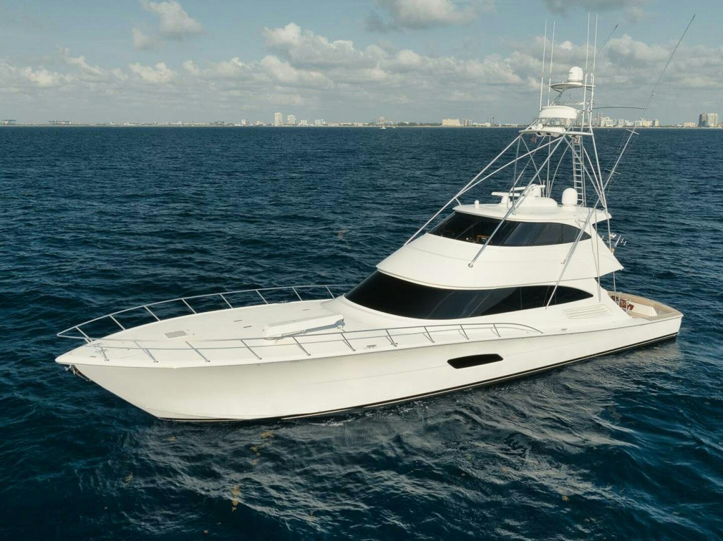 a white boat in the water aboard FA-LA-ME Yacht for Sale