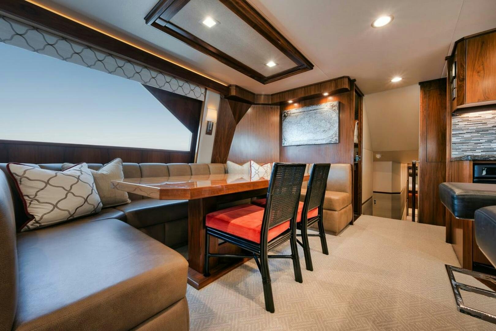 a room with a couch and a table aboard FA-LA-ME Yacht for Sale
