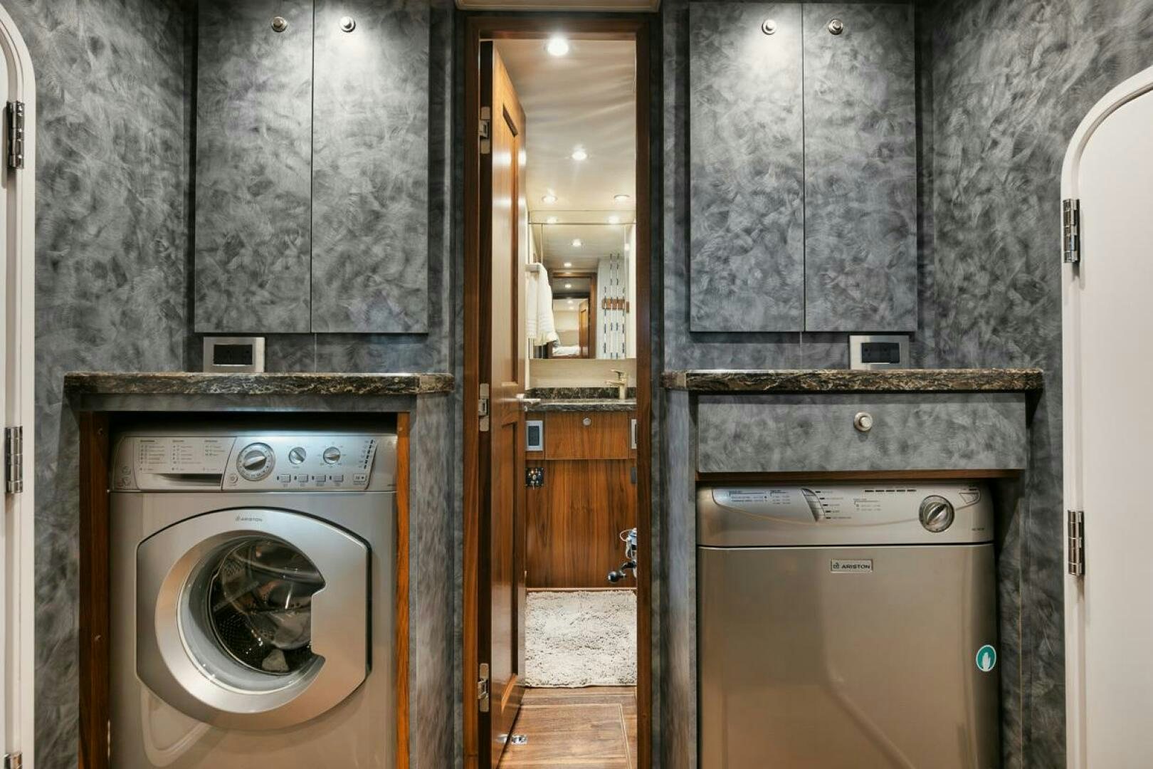 a laundry room with a washing machine aboard FA-LA-ME Yacht for Sale