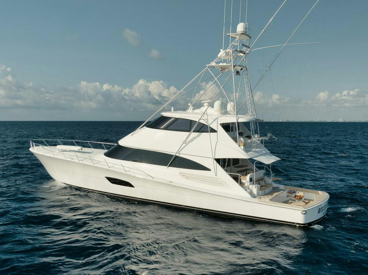 a white yacht in the water aboard FA-LA-ME Yacht for Sale