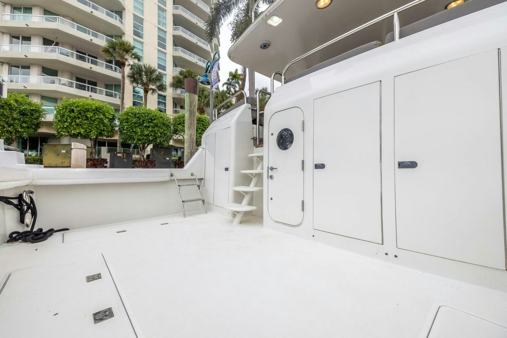 a white garage with doors aboard BOURBON LEGEND Yacht for Sale