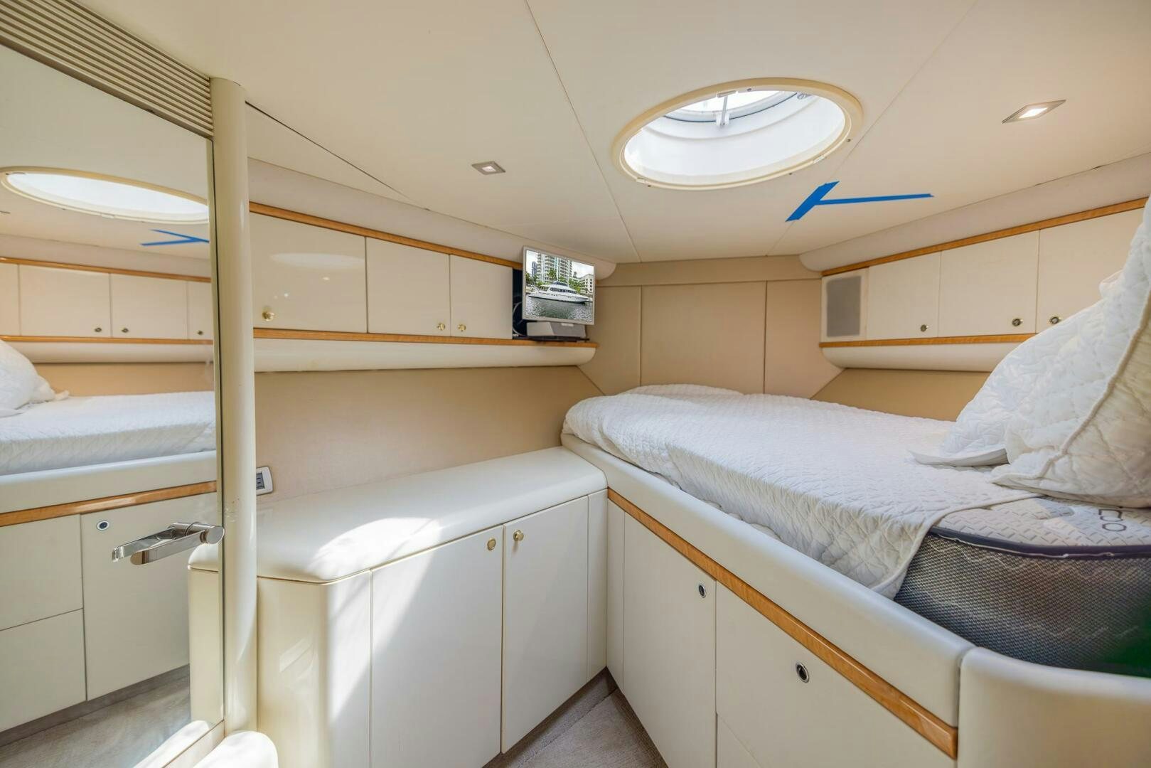 a small bedroom with a bunk bed aboard BOURBON LEGEND Yacht for Sale